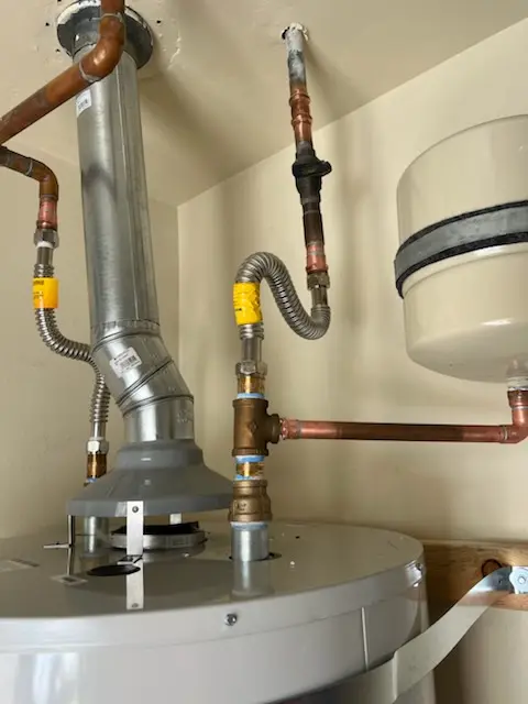 Water heater installation and plumbing repair in Cheesman Park